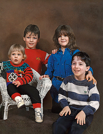 Photo Restoration of 4 siblings in a family group photo Professionally restored original photo - by A1Retouching.com